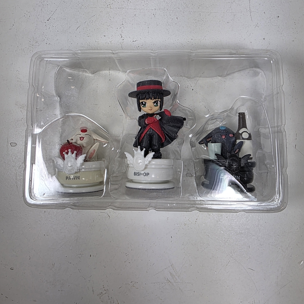 Chess Piece Figurine Set with Red and Black Accents
